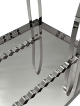 Roestvrijstalen deksel voor het ontsluiten van serviesgoed met honingraatframestandaard